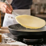 Pâte à crêpes de Christophe Michalak : le secret d'une recette ultra-légère, express sans repos et avec peu d’œufs